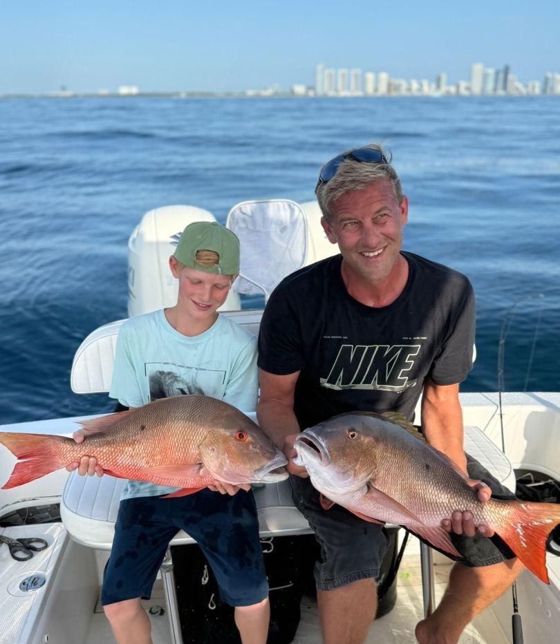 Two mutton snapper and sheepshead fish caught while fishing