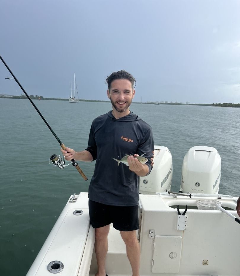 Lone angler fishing in scenic location