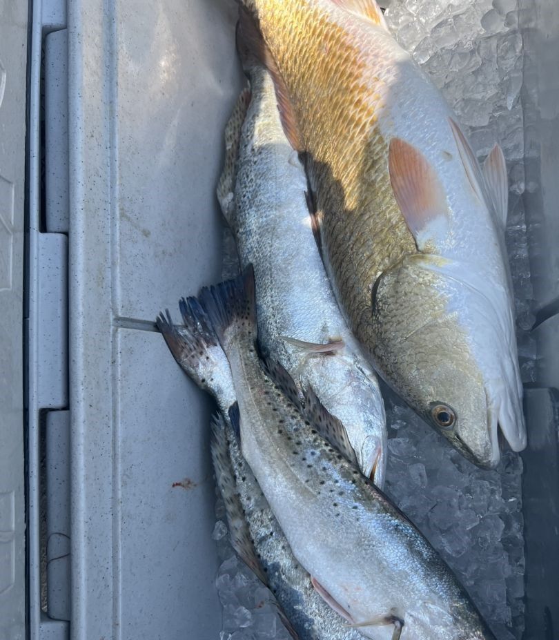 Fishing at an unknown location, with two fish caught.