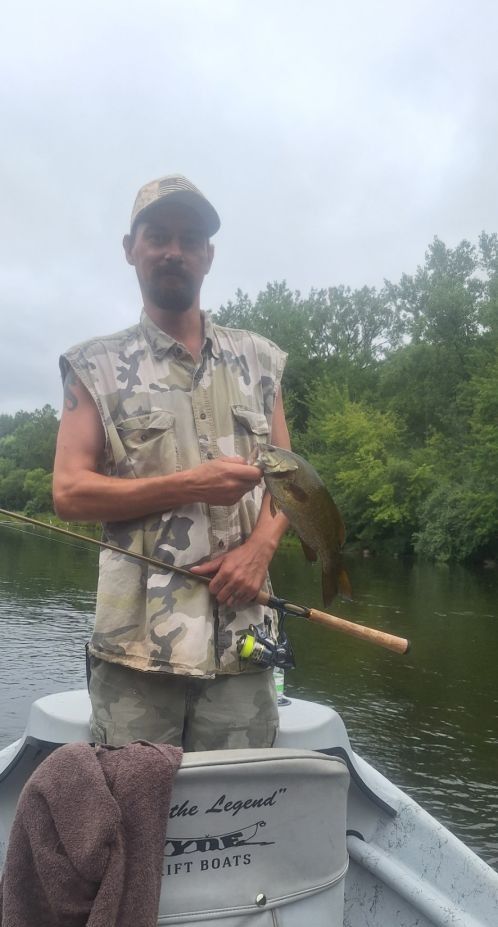 One person fishing at an unknown location