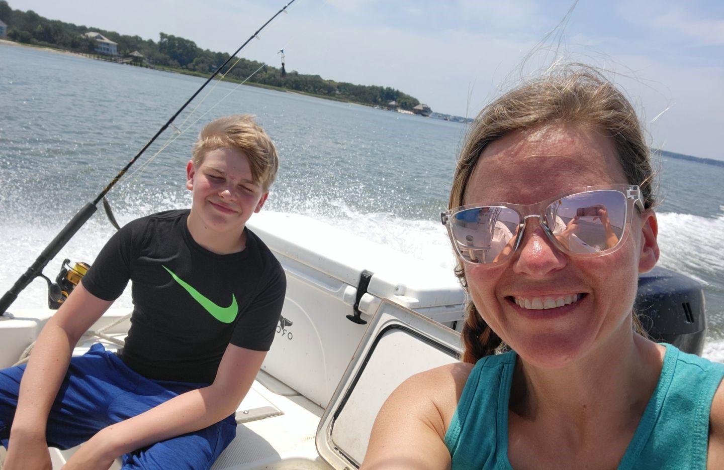 Two people fishing in a scenic location