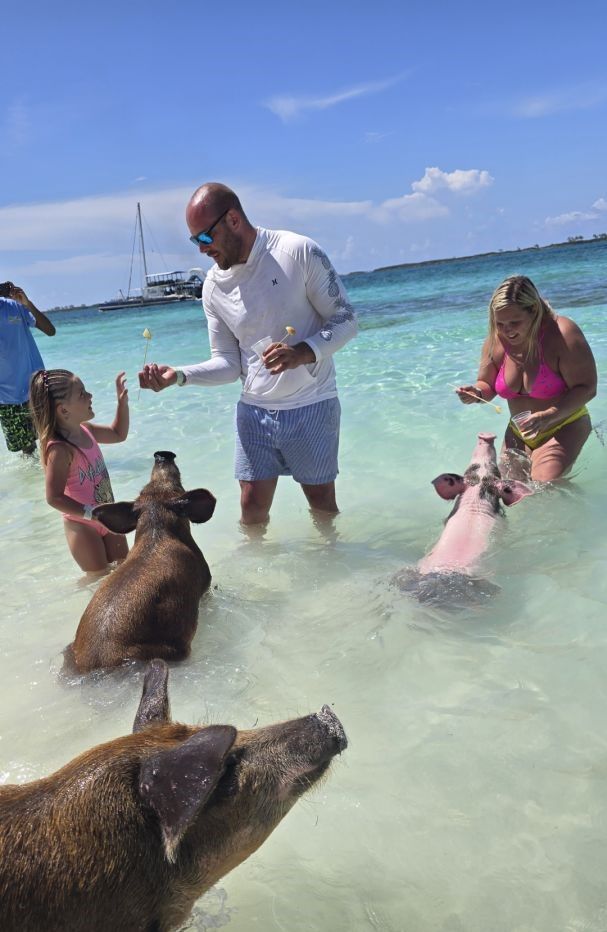Three people fishing at an unknown location
