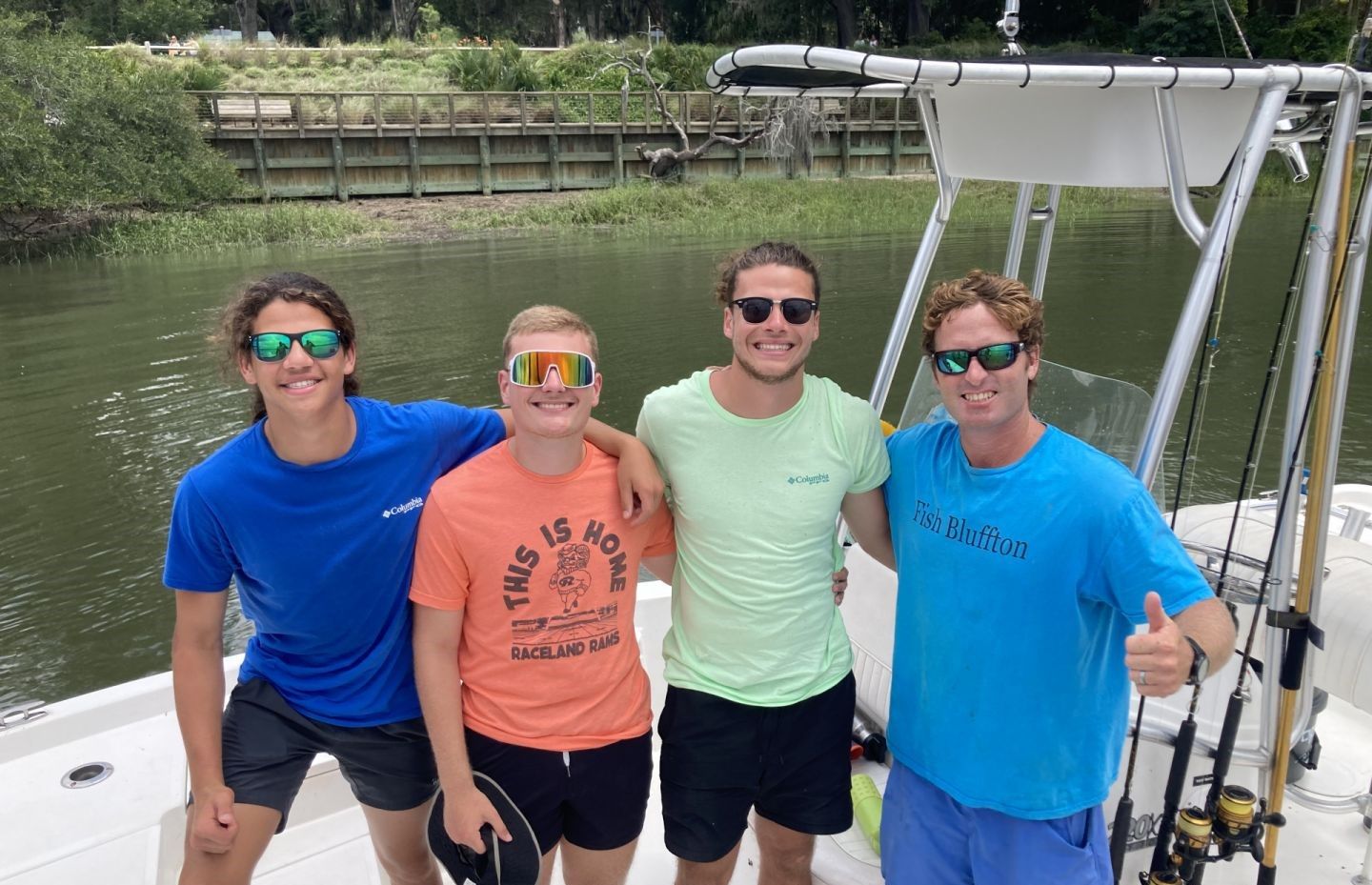Group of 4 people enjoying a fishing trip