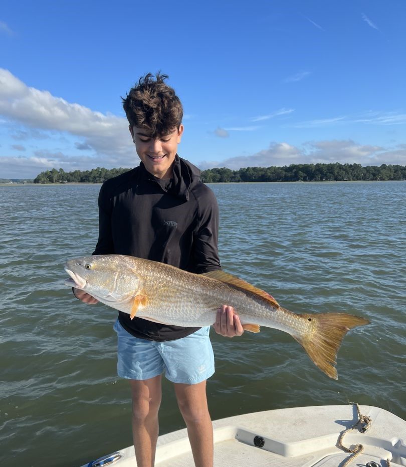 Solitary fisherman enjoying the unknown location
