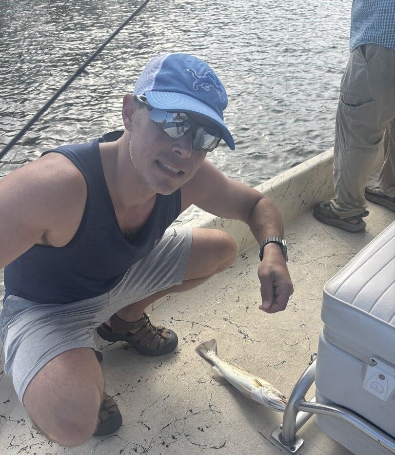 Fresh caught fish lying on boat deck after successful fishing trip