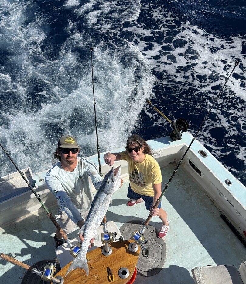 Great barracuda caught during deep sea fishing trip on sportfishing boat