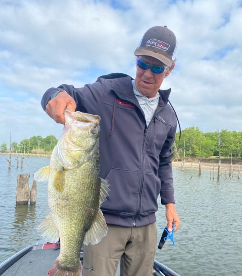 Catching a largemouth bass while fishing