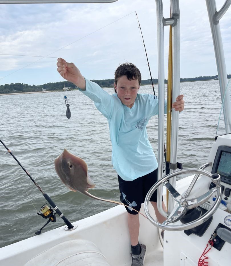 Solitary angler fishing at unknown location