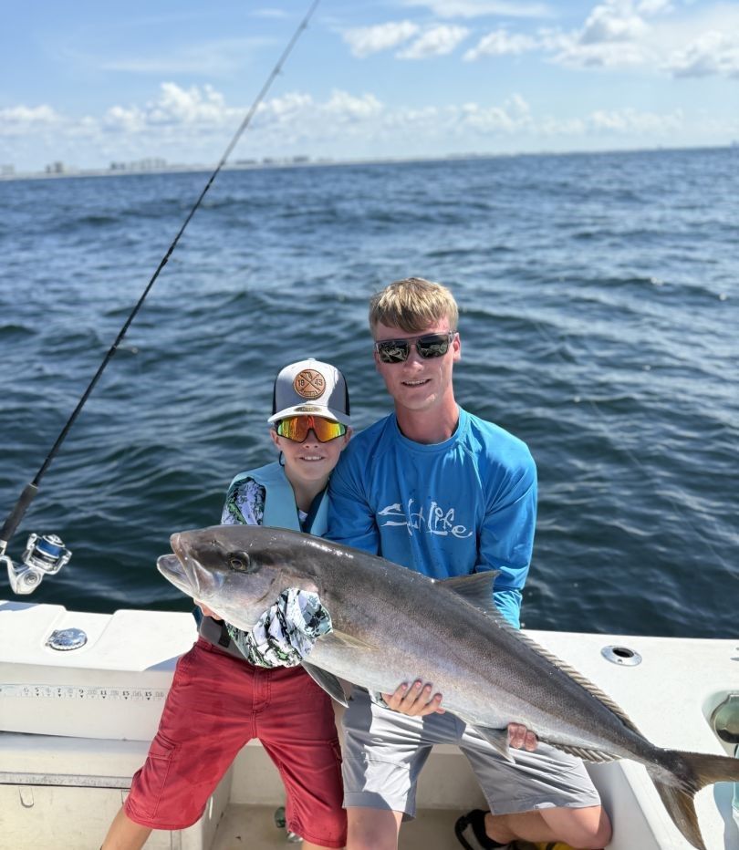 Large fish caught during offshore fishing trip on boat