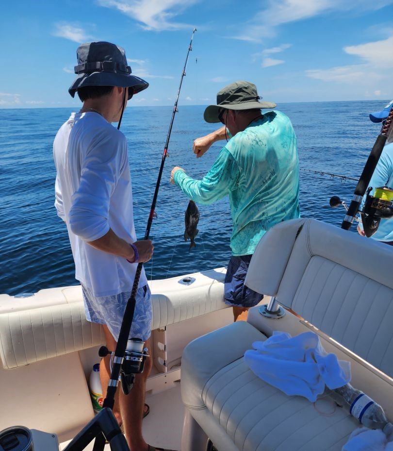 Lone angler fishing in unknown location