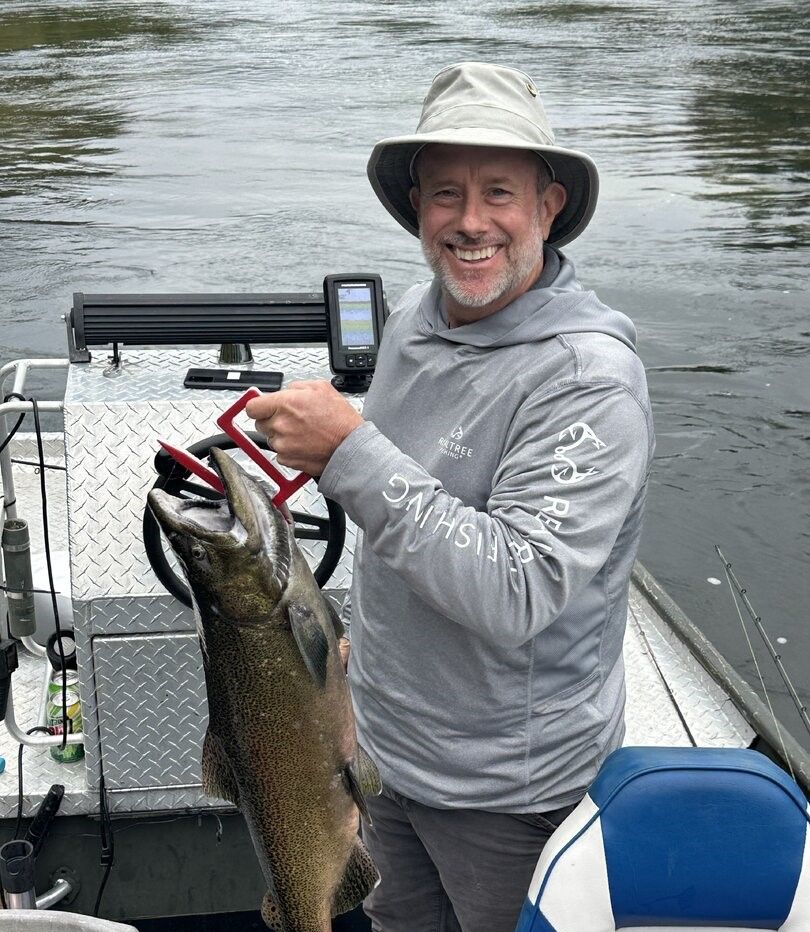 Single rainbow trout fish caught while fishing
