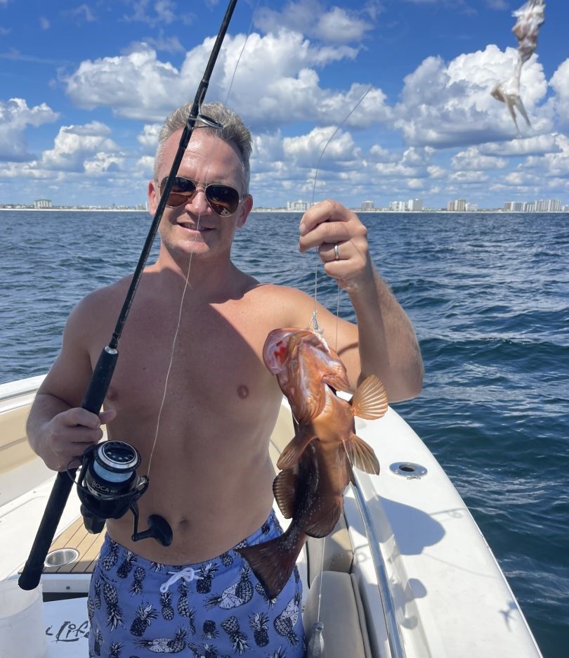 Red grouper caught while fishing on boat in open water