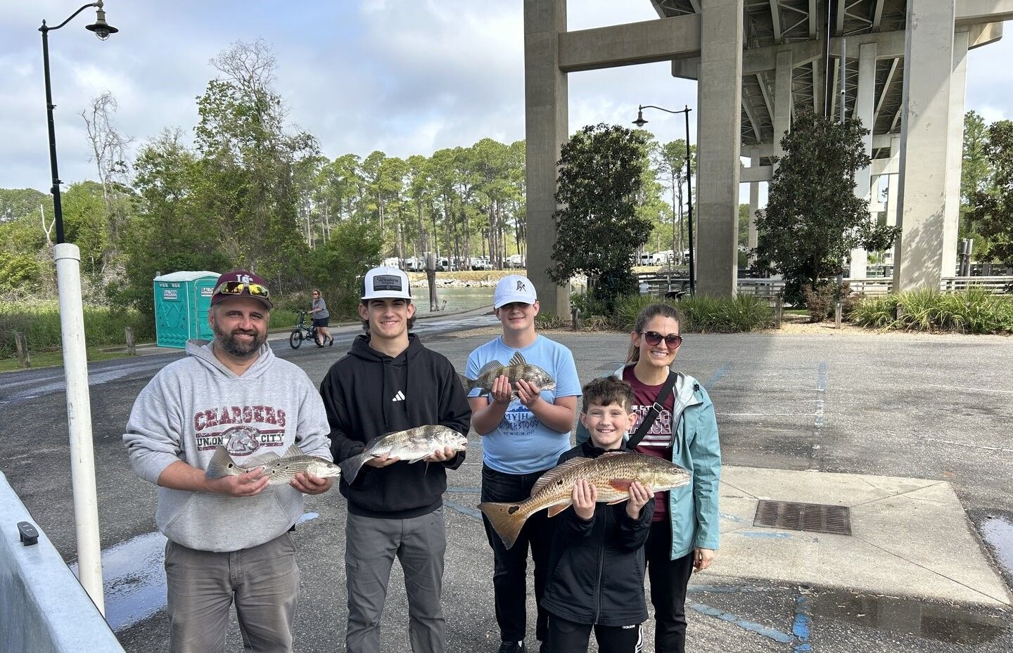Successful fishing trip with redfish and black drum catch displayed