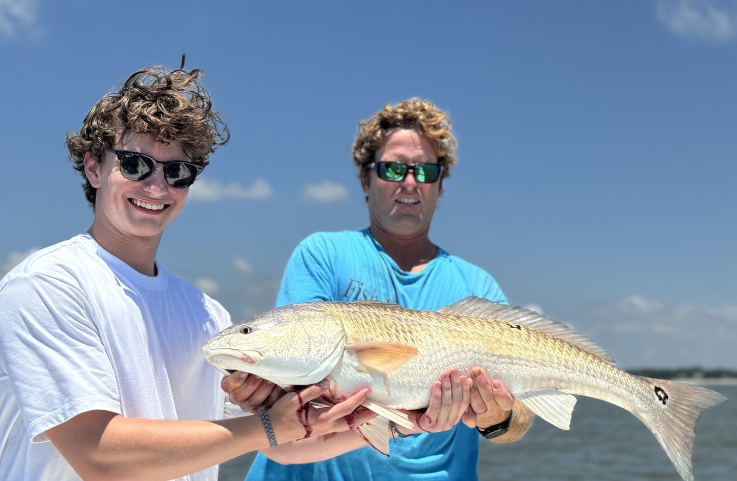 Redfish measuring 23 inches caught while fishing
