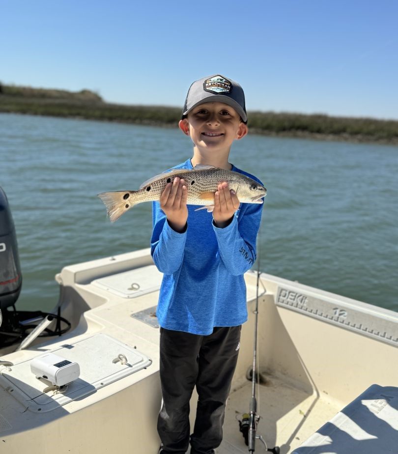 Redfish catch displayed on fishing boat