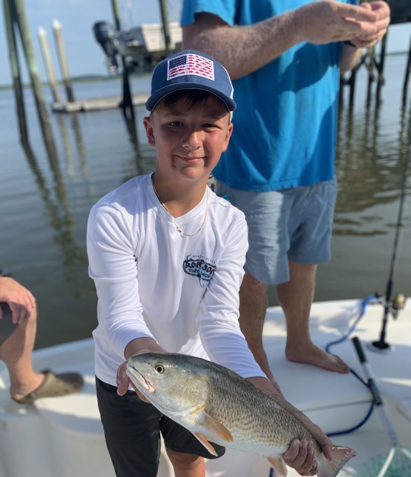 Redfish caught by angler while fishing