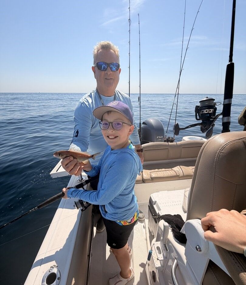 Small fish caught while fishing on boat in open water