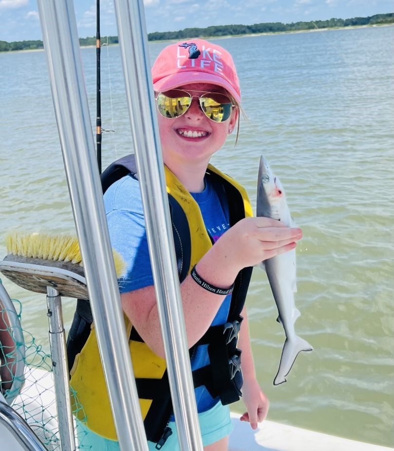 Lone angler enjoying a successful fishing trip
