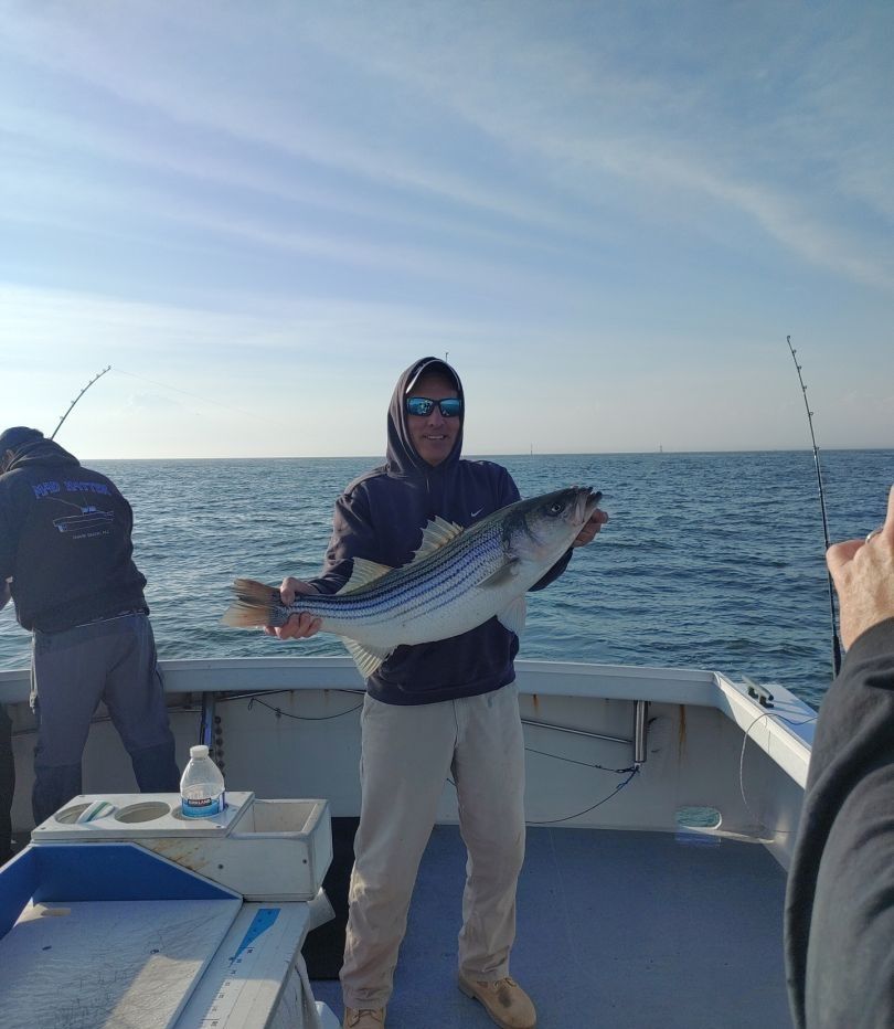 Striped bass fishing at an unknown location