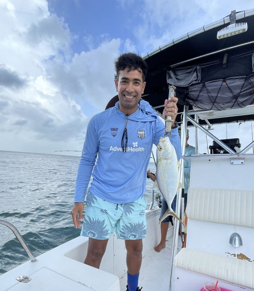 Fishing catch displayed on boat deck over ocean waters