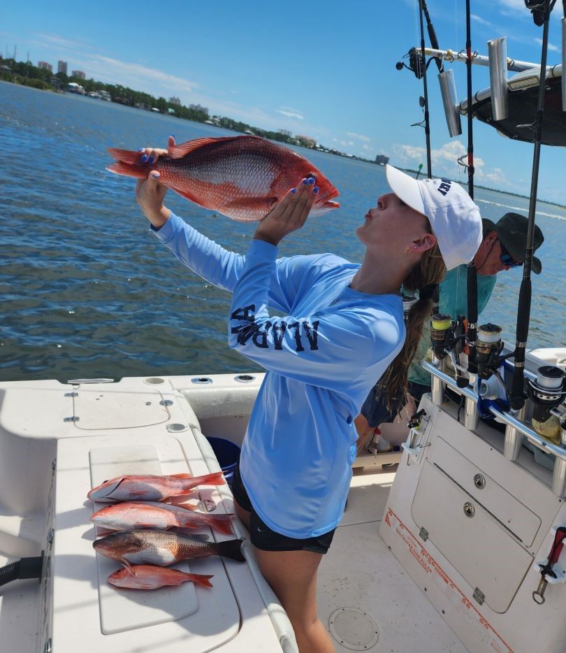 Four fish caught while fishing at unknown location