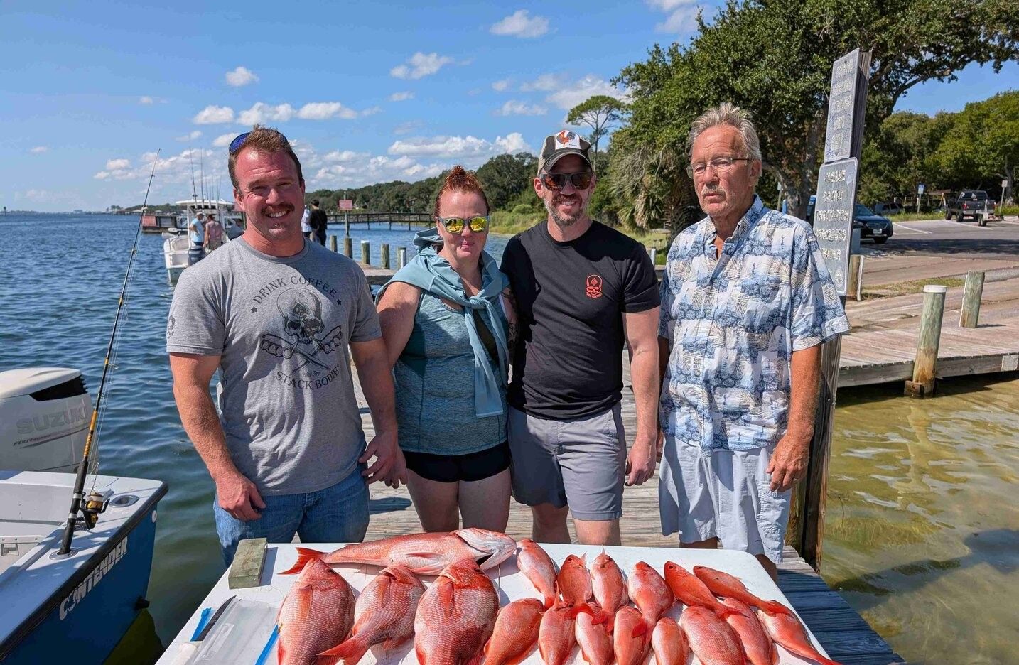 Four anglers enjoying a great fishing trip