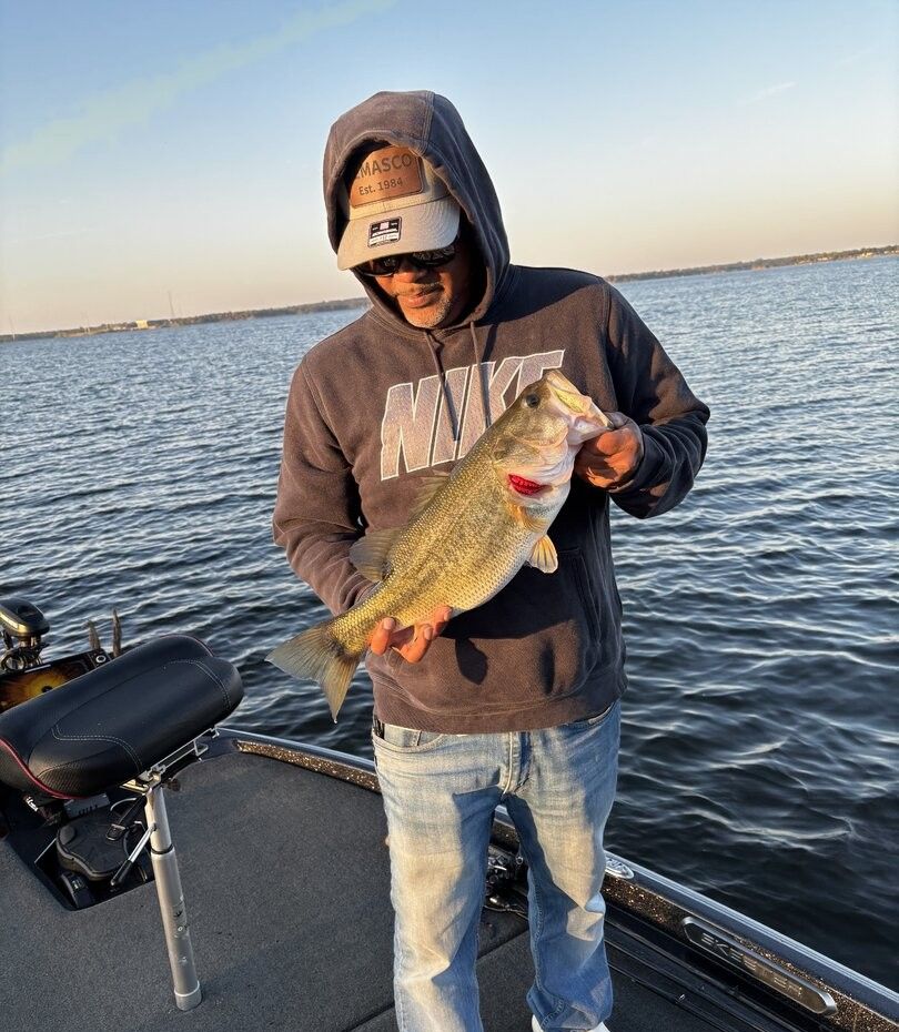 Lone angler fishing in unknown location