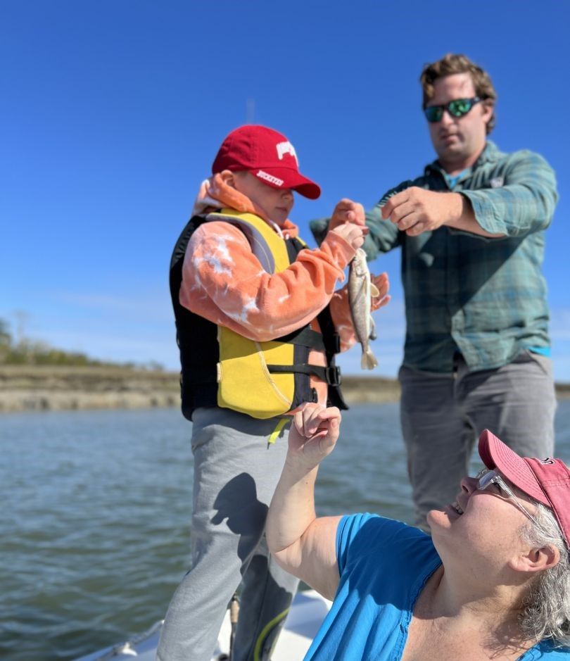 A pair of anglers fishing in an unknown location