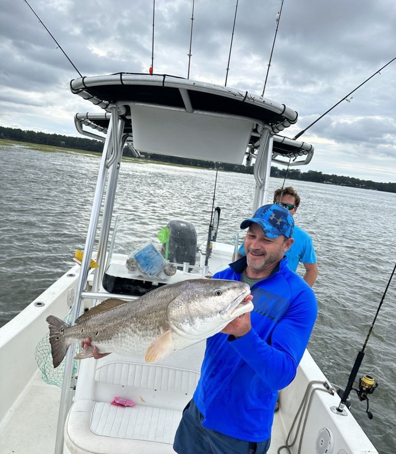 A fishing trip with two people at an unknown location