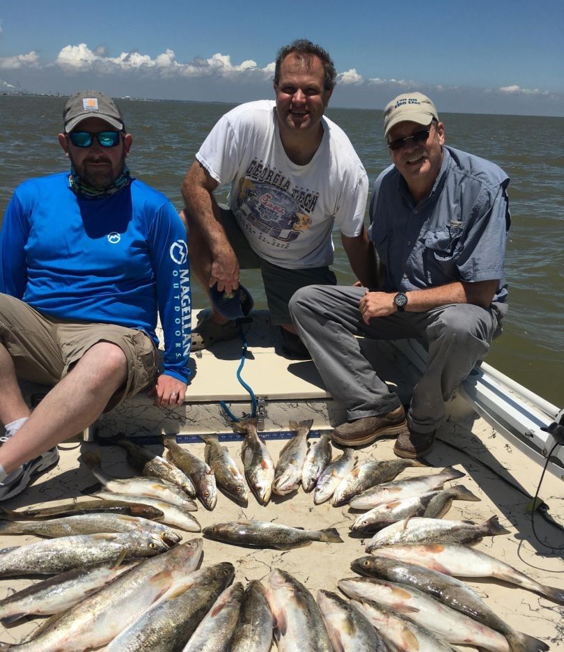 Trio of anglers fishing in unknown location