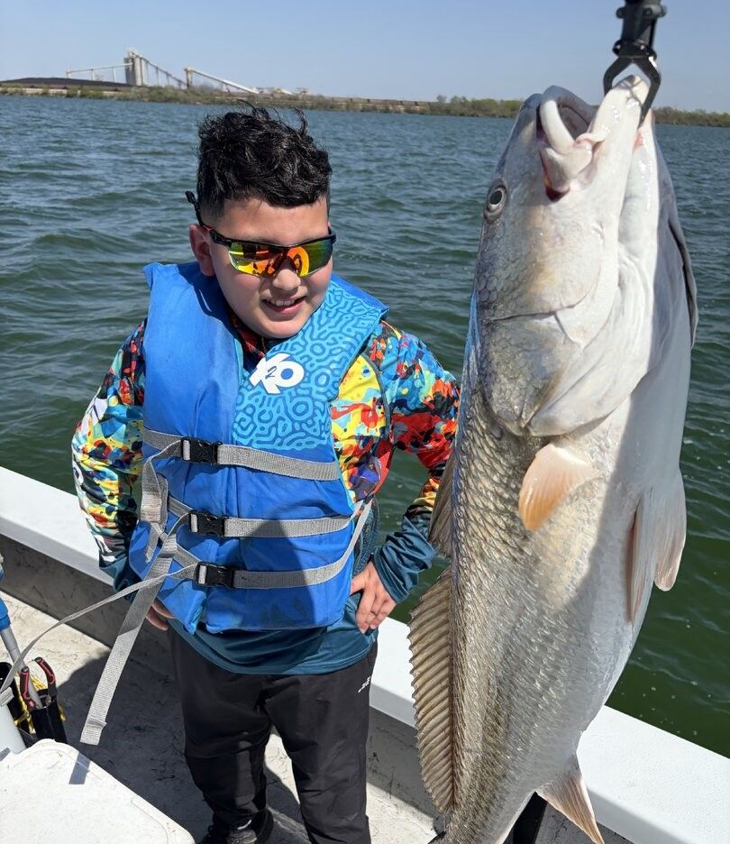 Large redfish caught and displayed on fishing boat