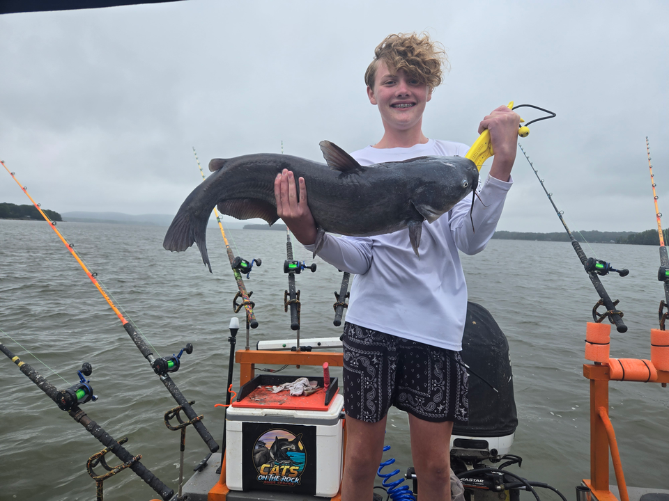 Big Blue Catfish reeled in on a partly cloudy day!