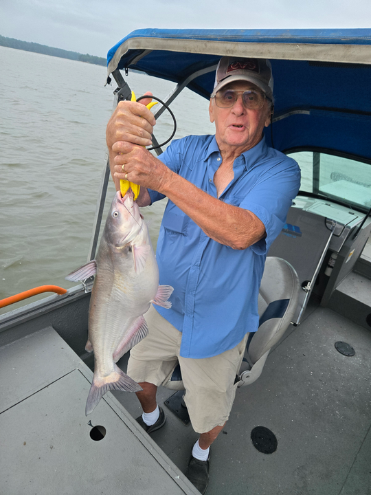 Reeling in a 16-inch Channel Catfish on a stormy day!