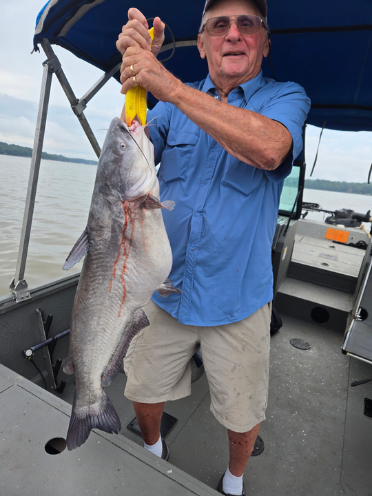 Huge 22-inch Channel Catfish hooked during a partly cloudy day!