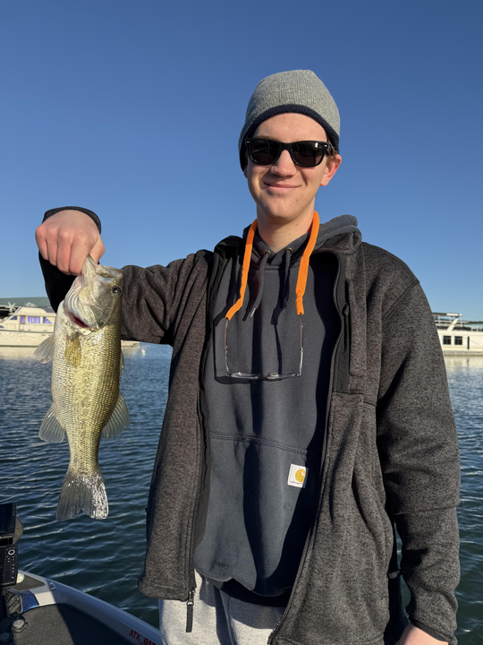 Reeling in the big one on a peaceful day out.