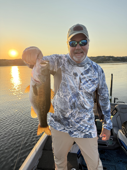 Nice largemouth bass caught on fly fishing with light tackle during perfect clear conditions!