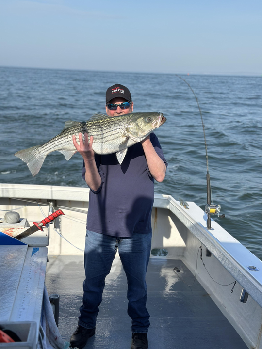 Hooked a massive striped bass while exploring the best fishing spots in Neptune City!