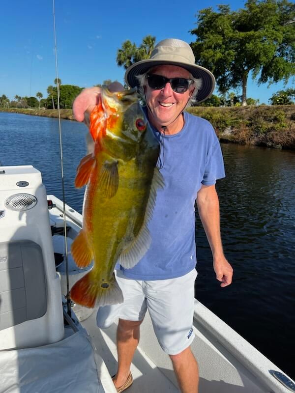 A single angler fishing in an unknown location