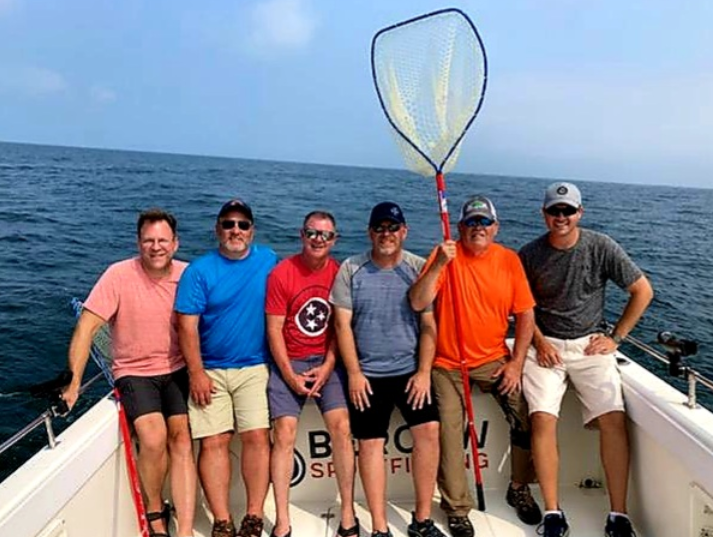 People fishing in unknown location