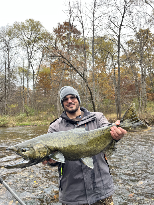 Great catch on the fly today! Clouds rolling in but the fishing stayed hot.