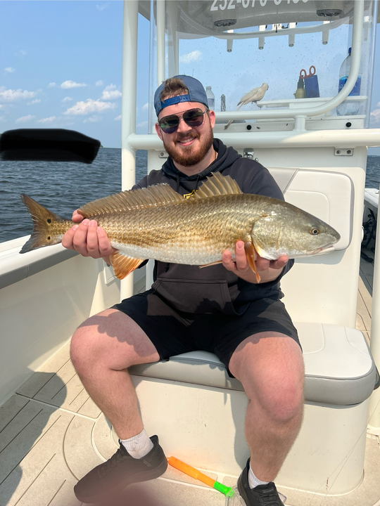 Mastering the art of light tackle fishing on a partly cloudy day