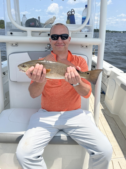 Battling the elements with light tackle on a partly cloudy day.