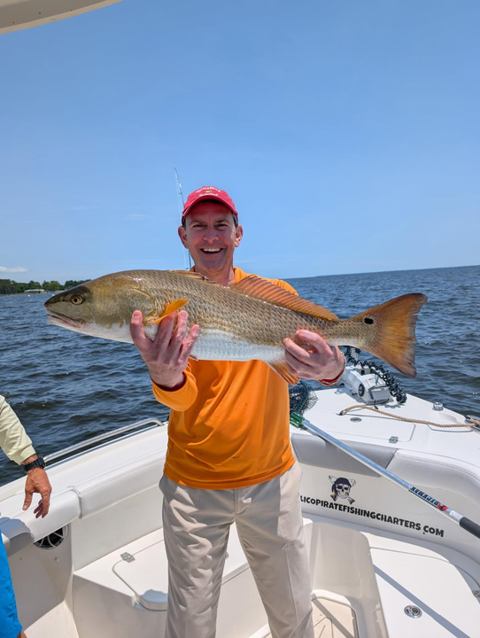 That redfish sure put up a fight! Beautiful catch in Oriental, NC.