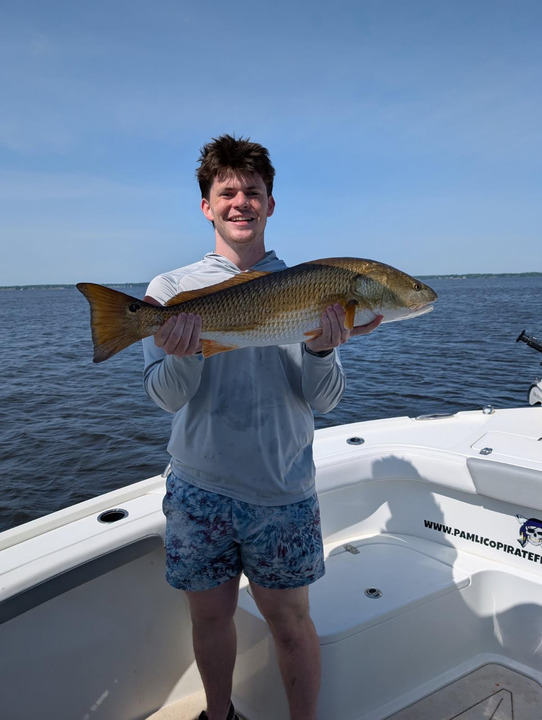 A big redfish caught with expert light tackle skills!