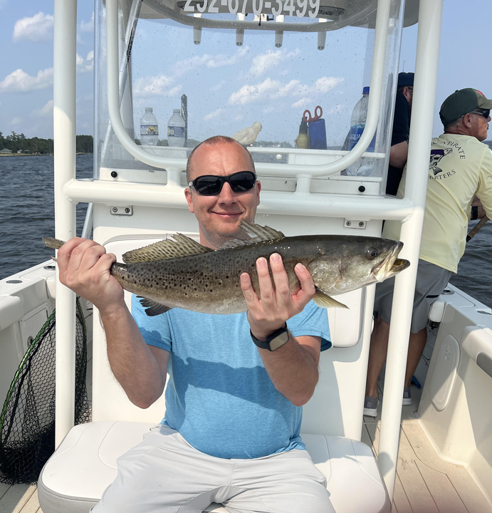 A thrilling catch of a spotted weakfish on a light tackle adventure in Minnesott Beach!