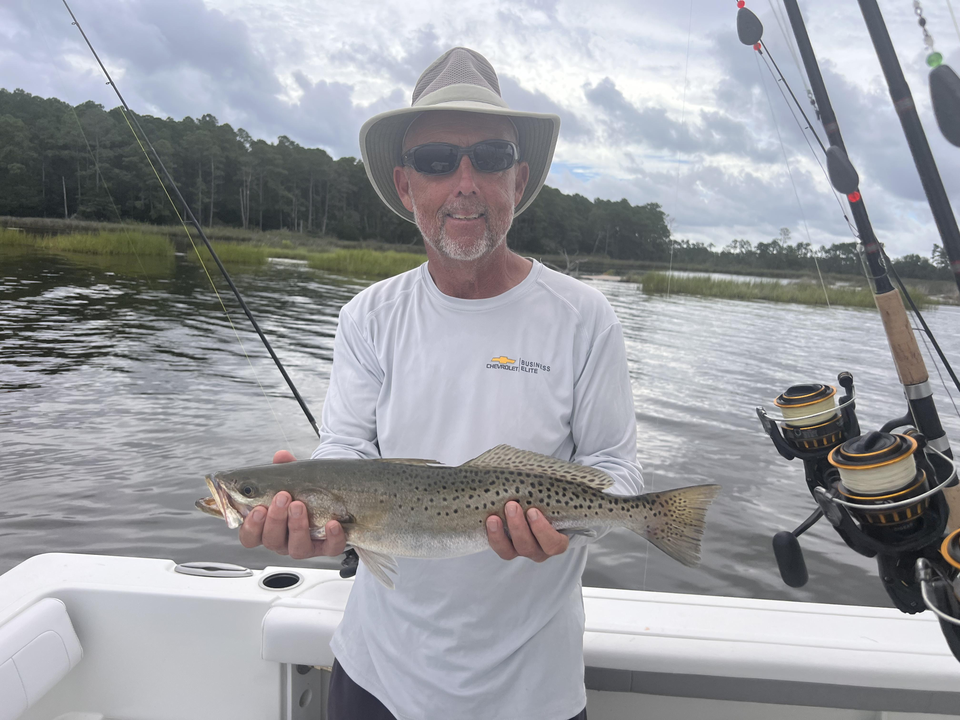 Reeling in a big Spotted Weakfish with finesse!