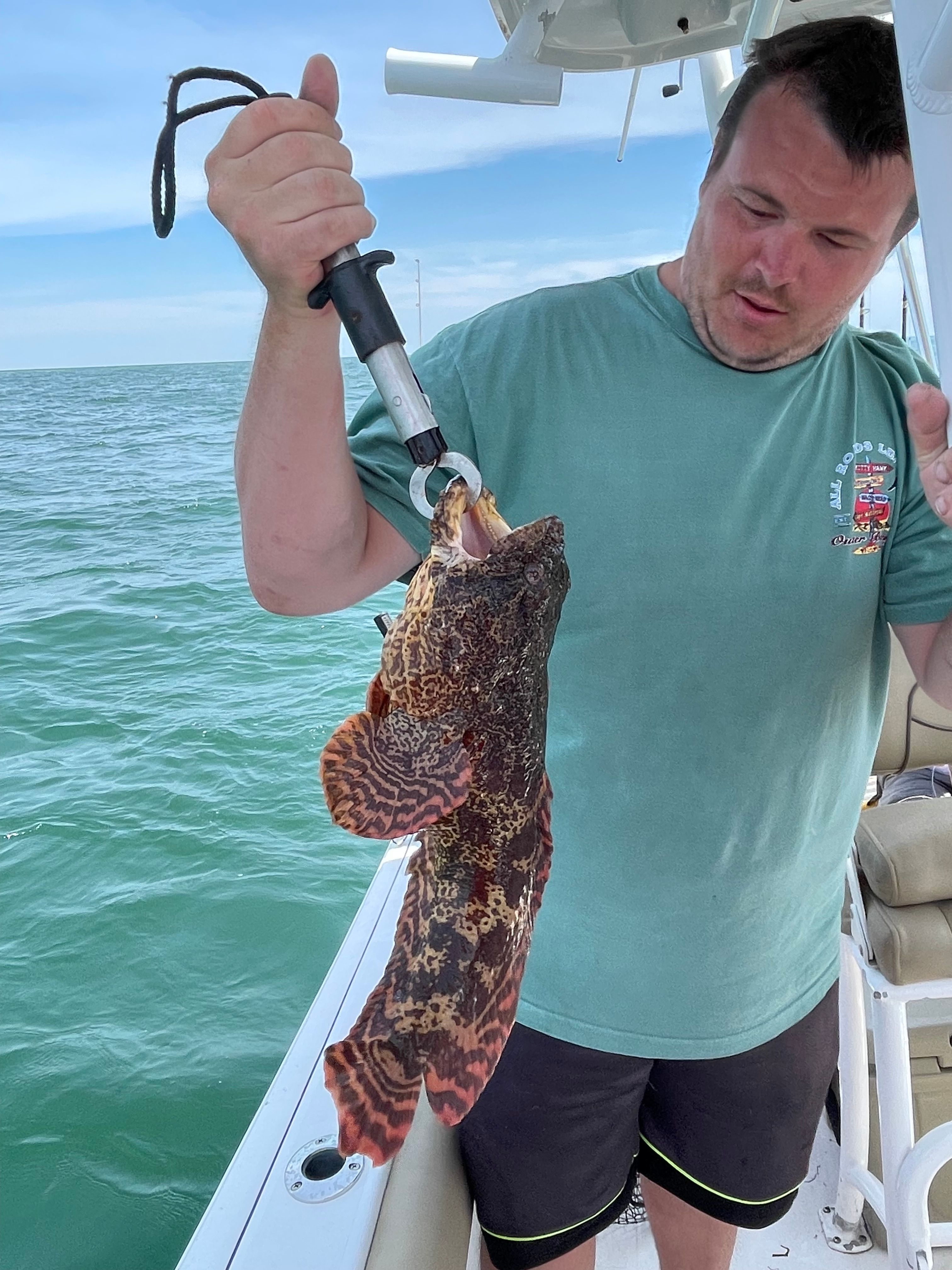 A single fisherman with a 17-inch catch