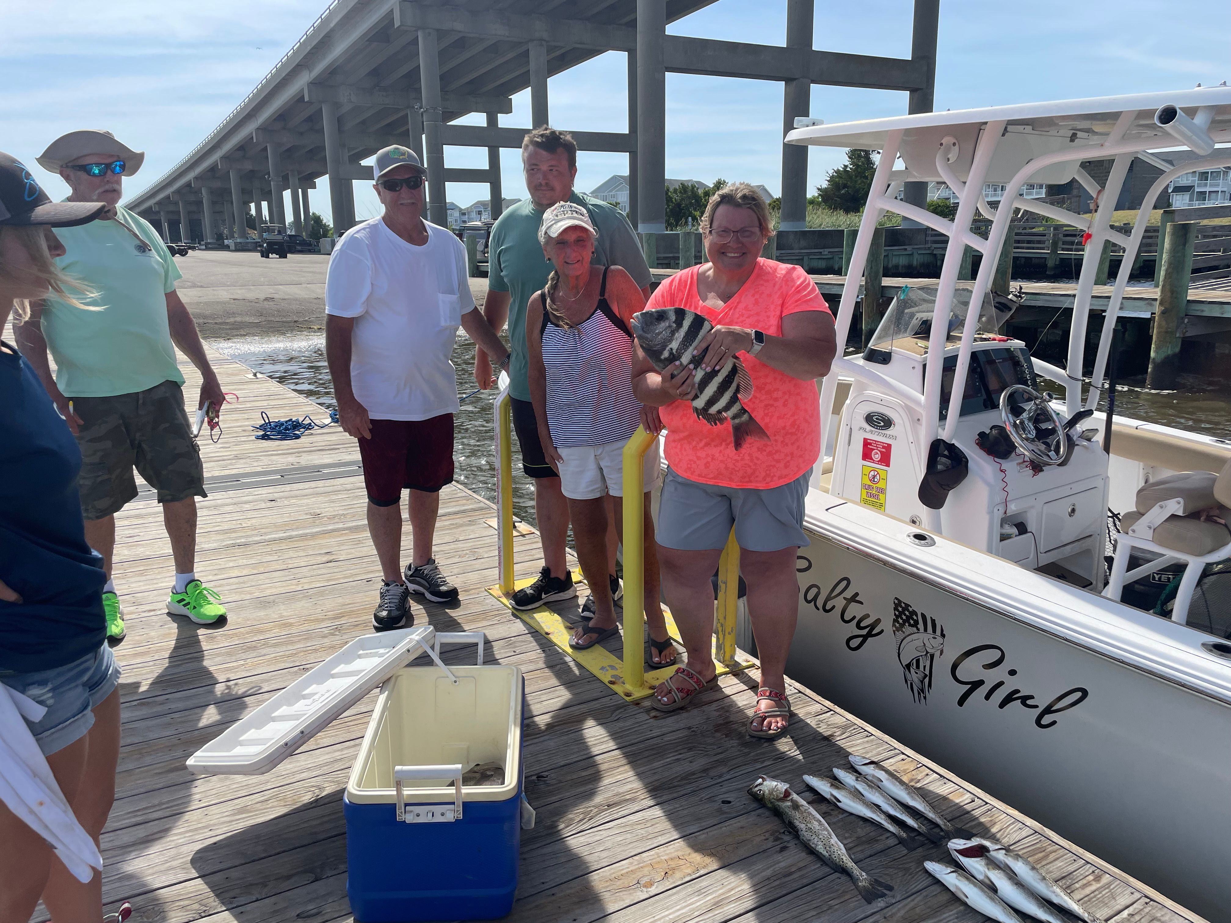 Fishing for a sheepshead, 7-inch catch