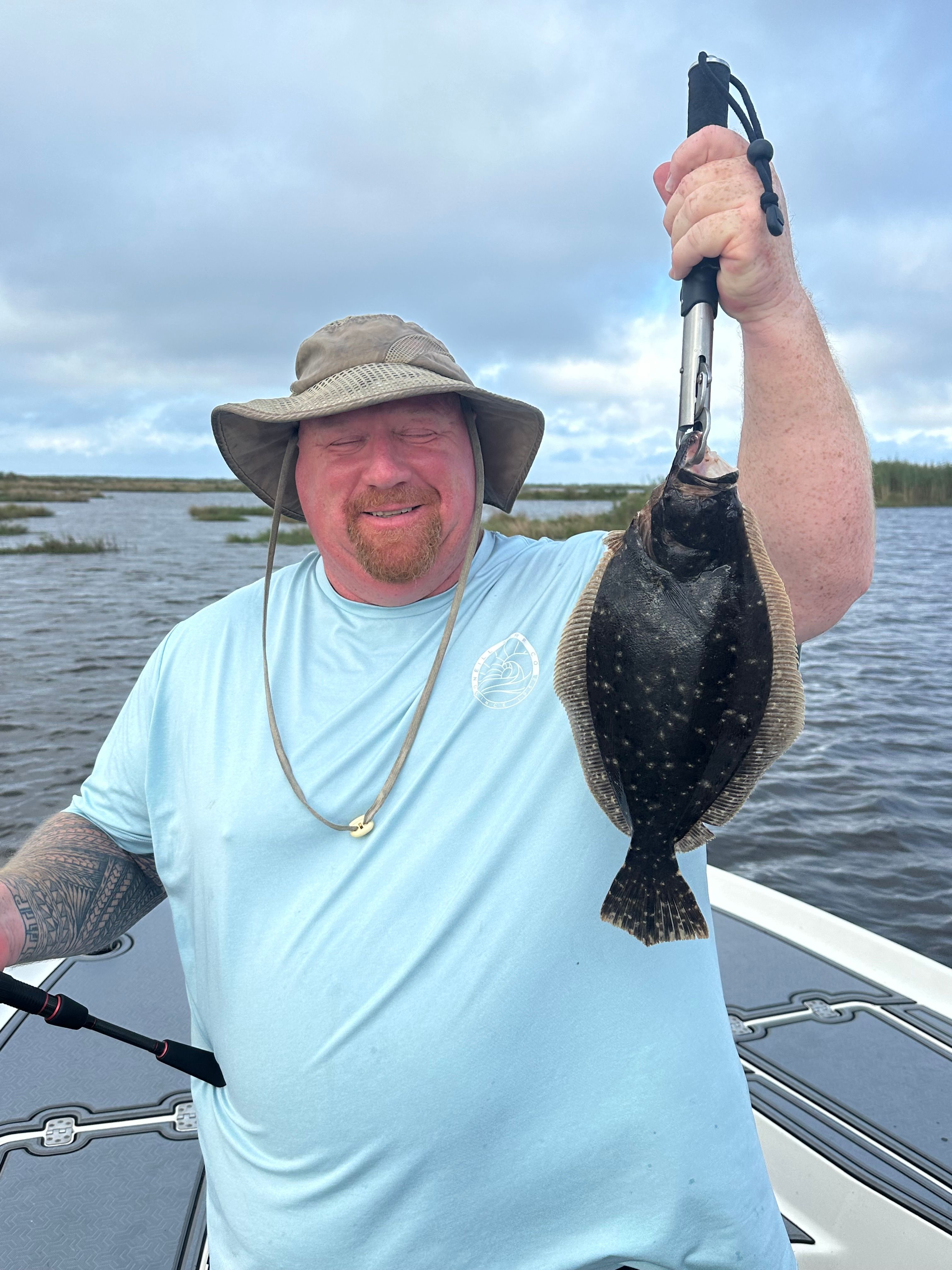 A summer flounder fish caught while fishing