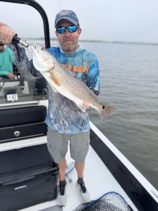 Big redfish catch on light tackle as skies clear in Hubert!